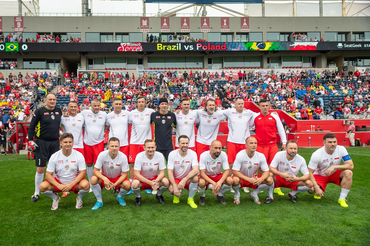 Polish legends team in white and red kits at the Poland vs Brazil football legends match