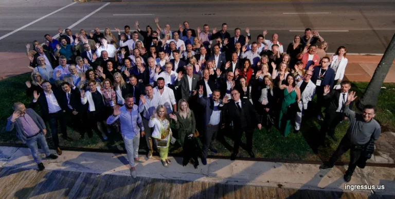Participants of the 60 Million Congress waving in a group photo taken from above in Miami Beach, January 2020