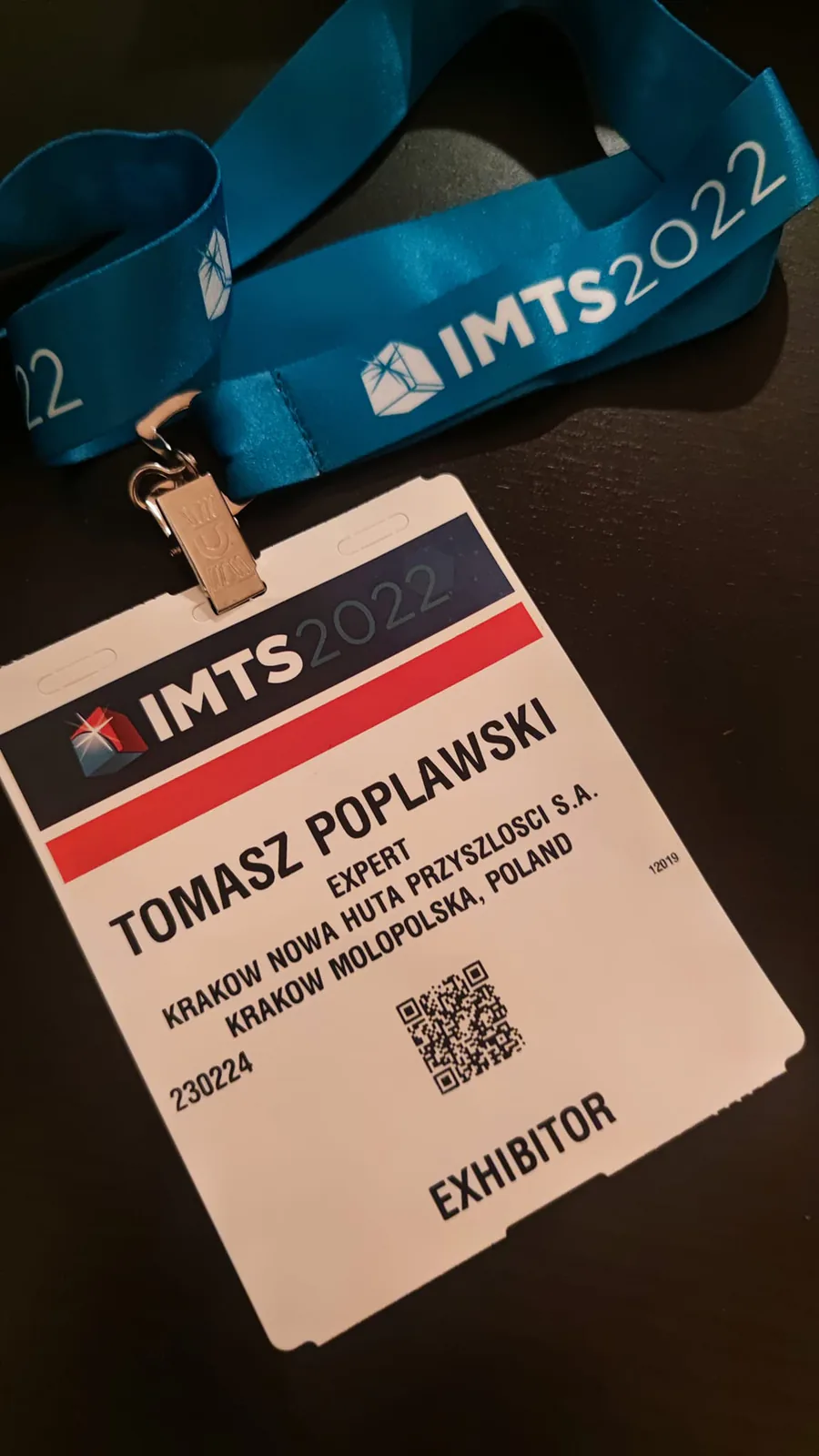 IMTS 2022 exhibitor badge and lanyard of Tomasz Popławski, representing Kraków Nowa Huta of the Future S.A.