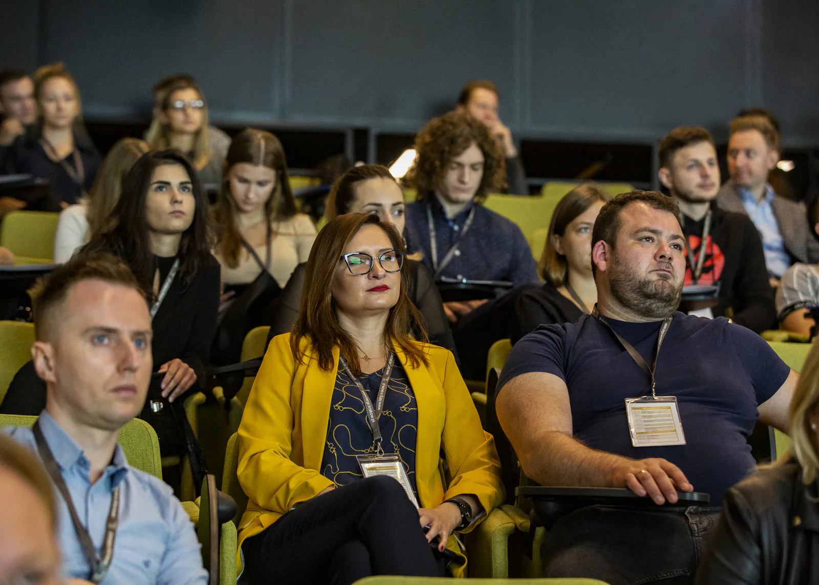 Congress participants with name badges listening attentively in the auditorium at ICE Kraków