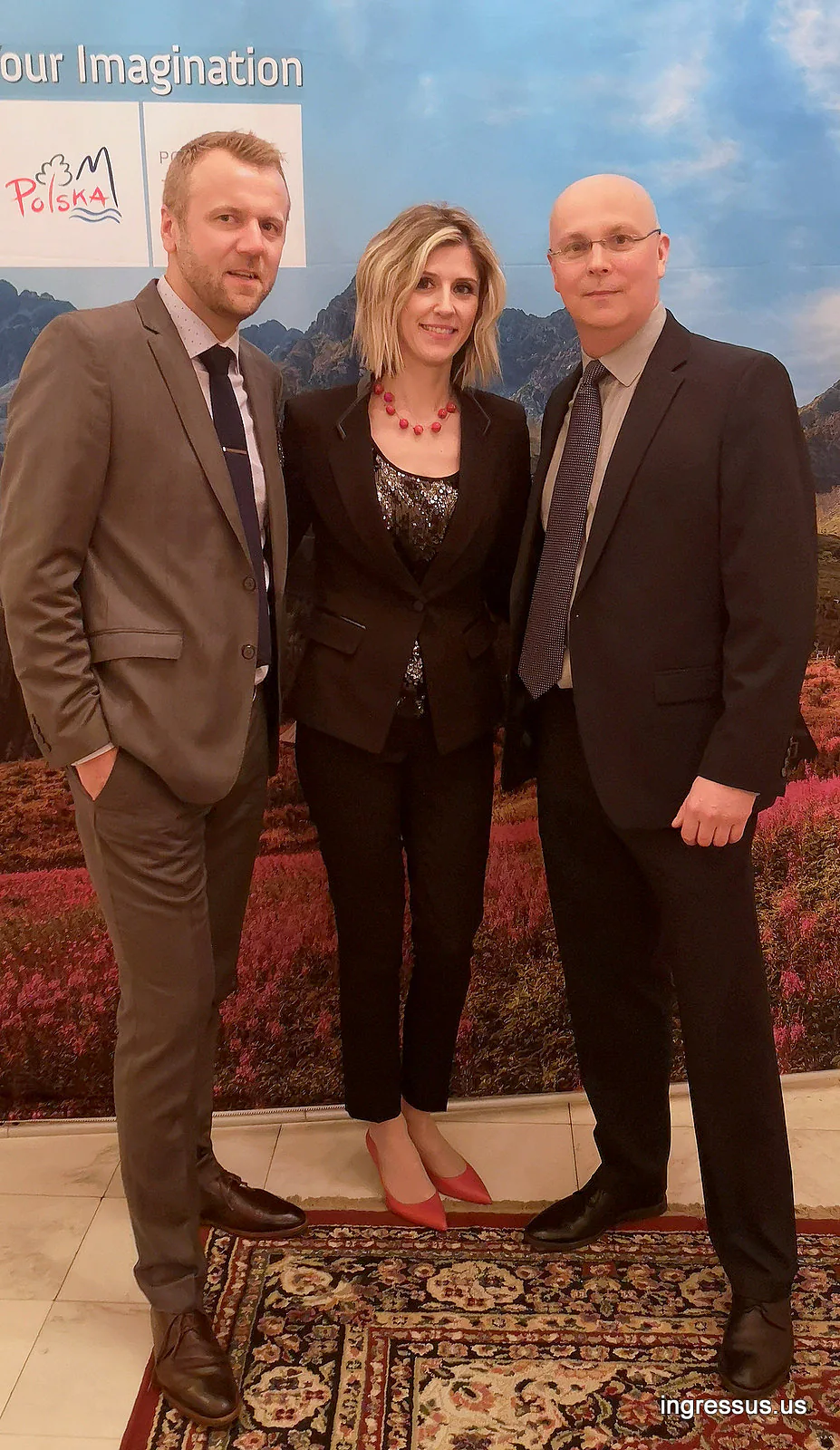 Ingressus team at the promotional event at the Polish Consulate General in Chicago, in front of a Polish Tourism Organization backdrop
