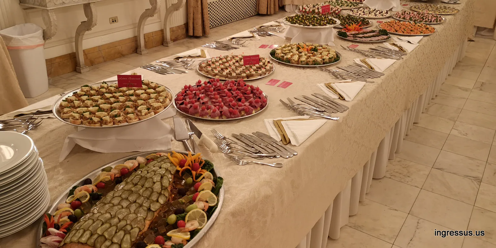 Catered buffet of canapés, desserts and a decorated fish platter prepared for the Małopolska event at the Polish Consulate General