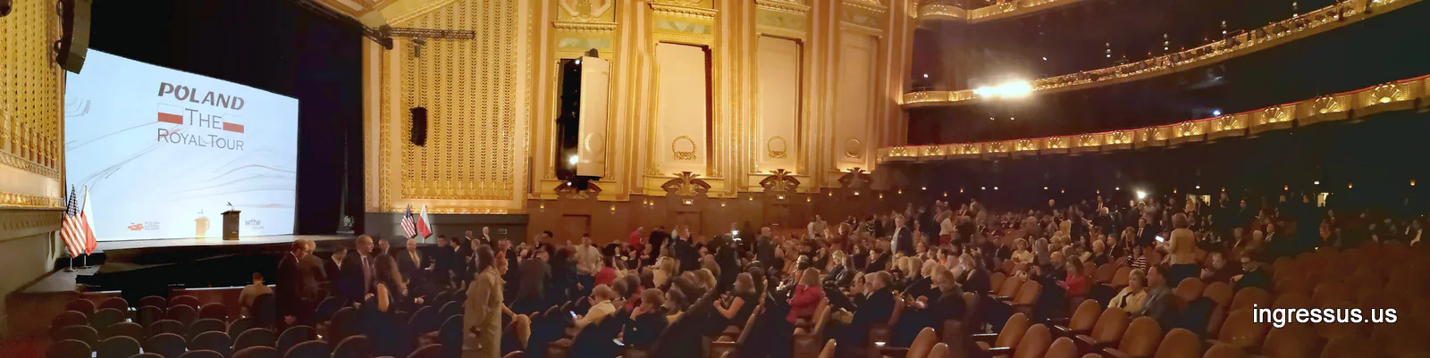 Panorama of the Lyric Opera House auditorium in Chicago filling up before the Poland: The Royal Tour premiere, title on the screen