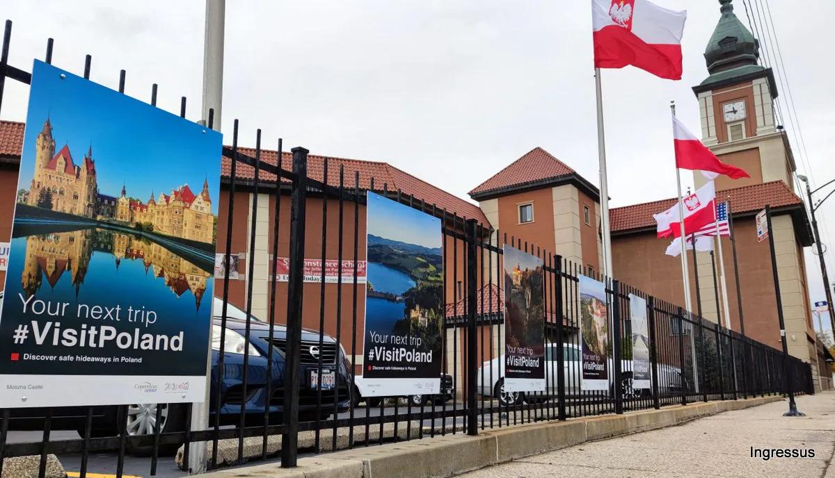 Your next trip #VisitPoland poster of Moszna Castle on the fence, with Polish flags and the Copernicus Foundation clock tower behind