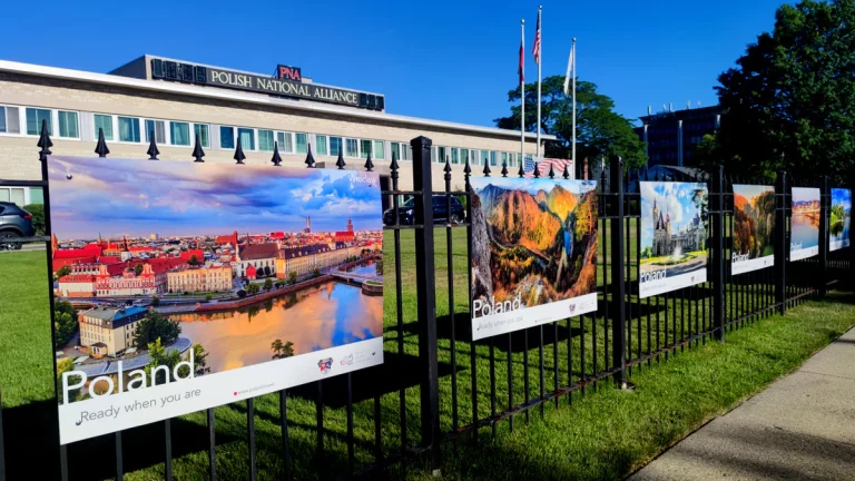 Poland, Ready when you are travel posters on the fence of the Polish National Alliance building in Chicago