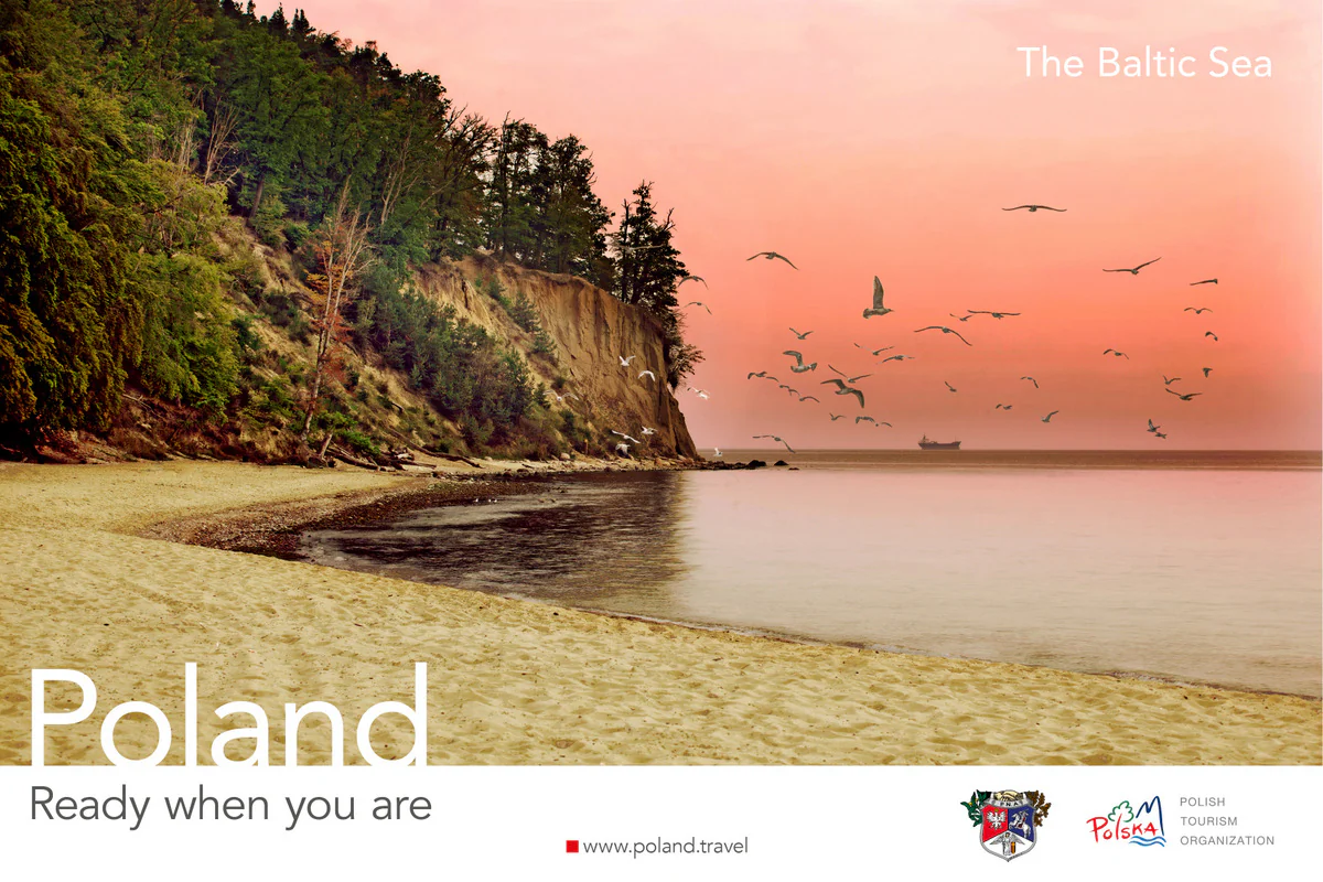 Poland, Ready when you are poster showing a sandy Baltic Sea beach below a wooded cliff, with seagulls at sunset