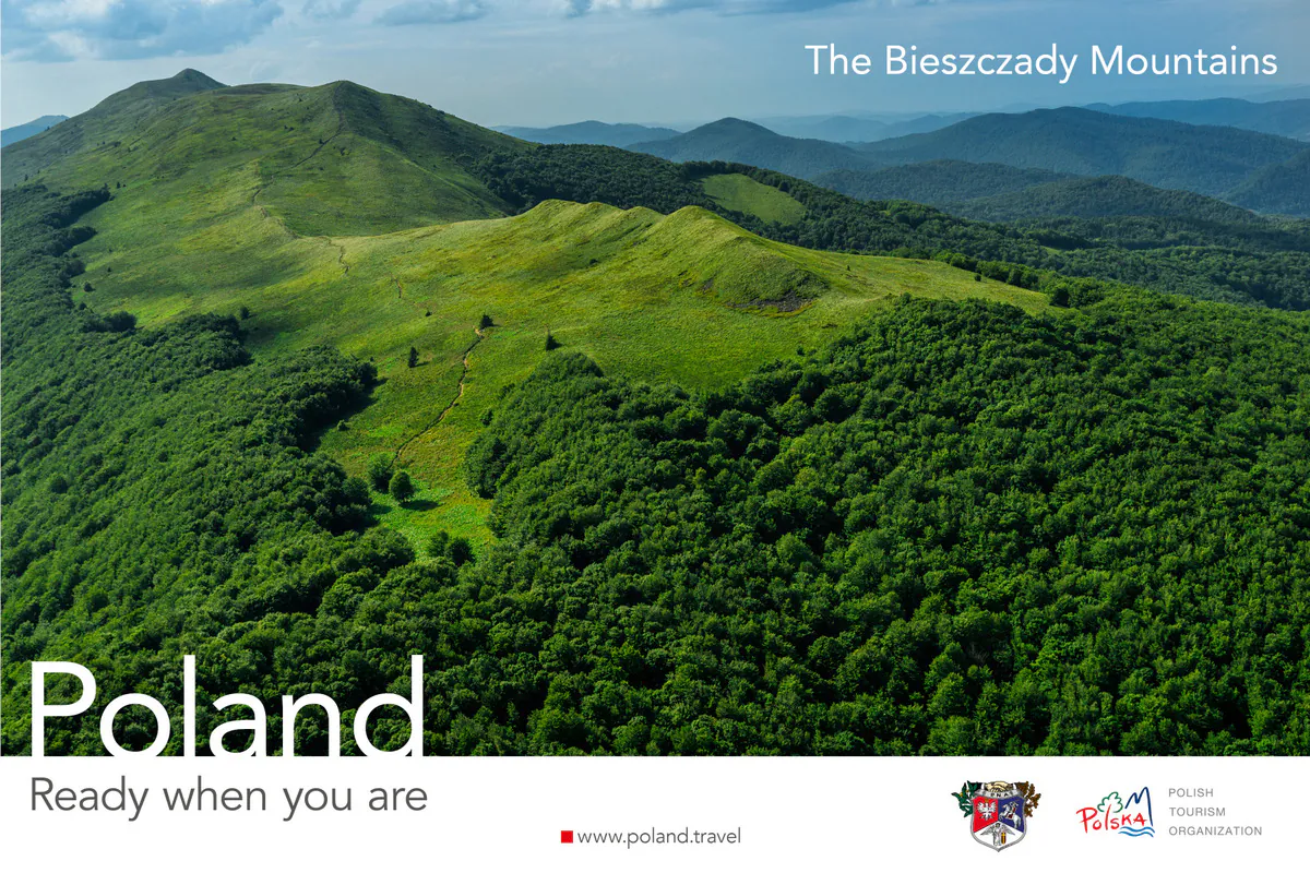 Poland, Ready when you are poster with an aerial view of the green ridges and forests of the Bieszczady Mountains