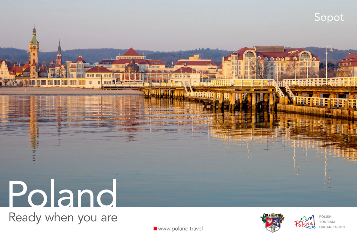 Poland, Ready when you are poster showing the Sopot pier and seaside buildings reflected in the Baltic at sunrise