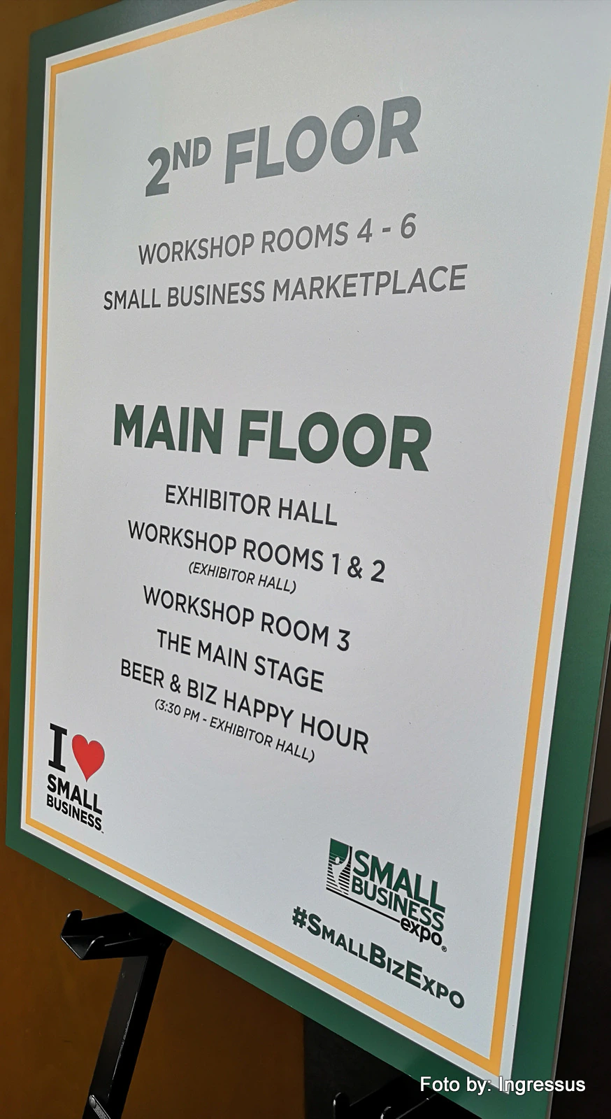 Small Business Expo floor directory sign listing the exhibitor hall, workshop rooms, main stage and Beer & Biz Happy Hour
