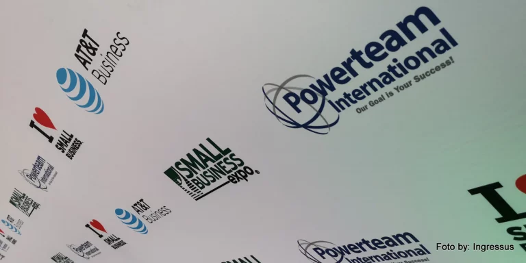 Sponsor backdrop at Small Business Expo 2019 in Chicago with Small Business Expo, AT&T Business and Powerteam International logos