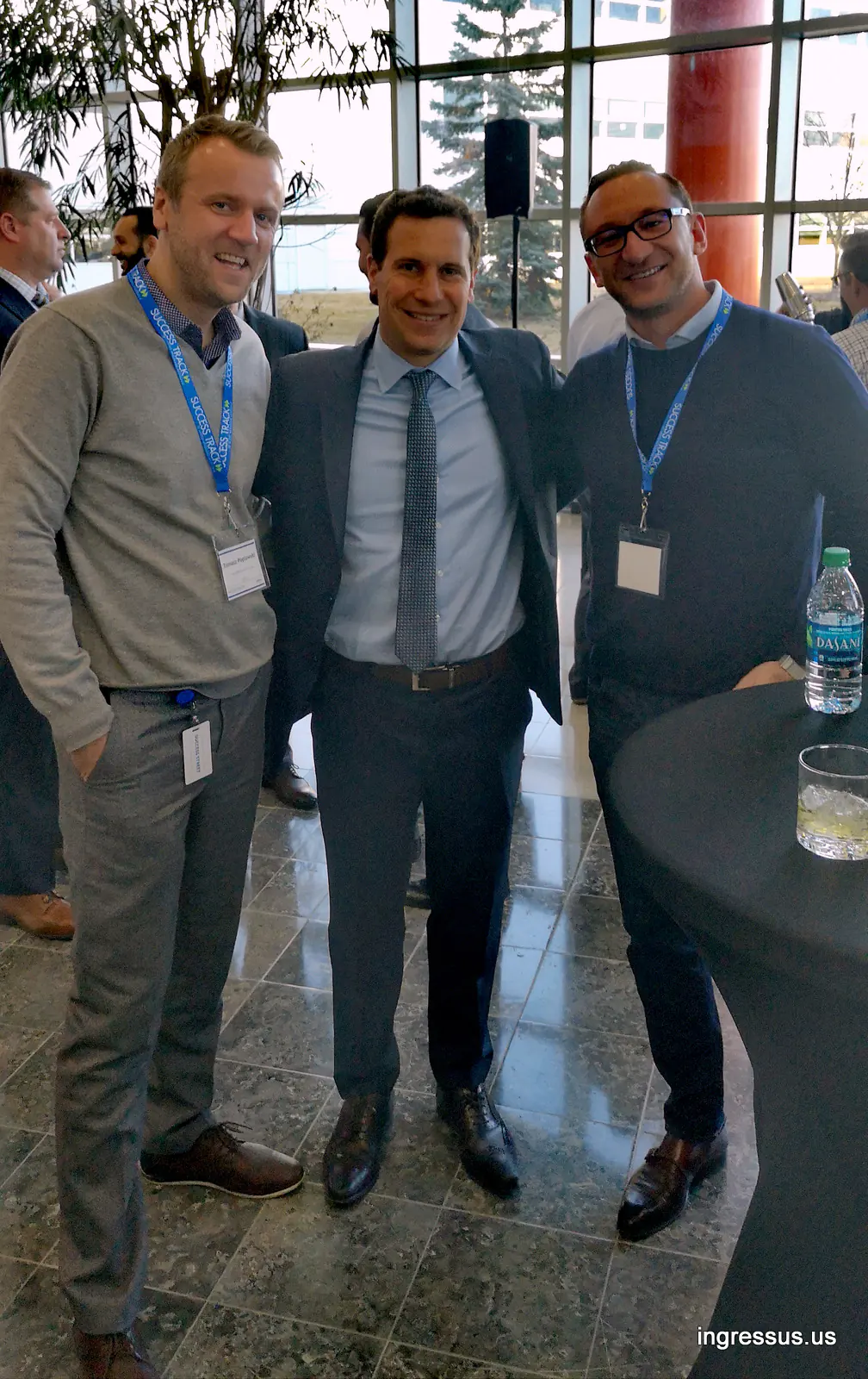 Success Track participants with United Wholesale Mortgage President and CEO Mat Ishbia in the atrium of the Pontiac headquarters