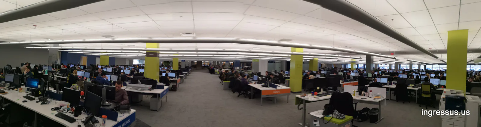 Wide panorama of a large open office floor with hundreds of workstations at United Wholesale Mortgage headquarters