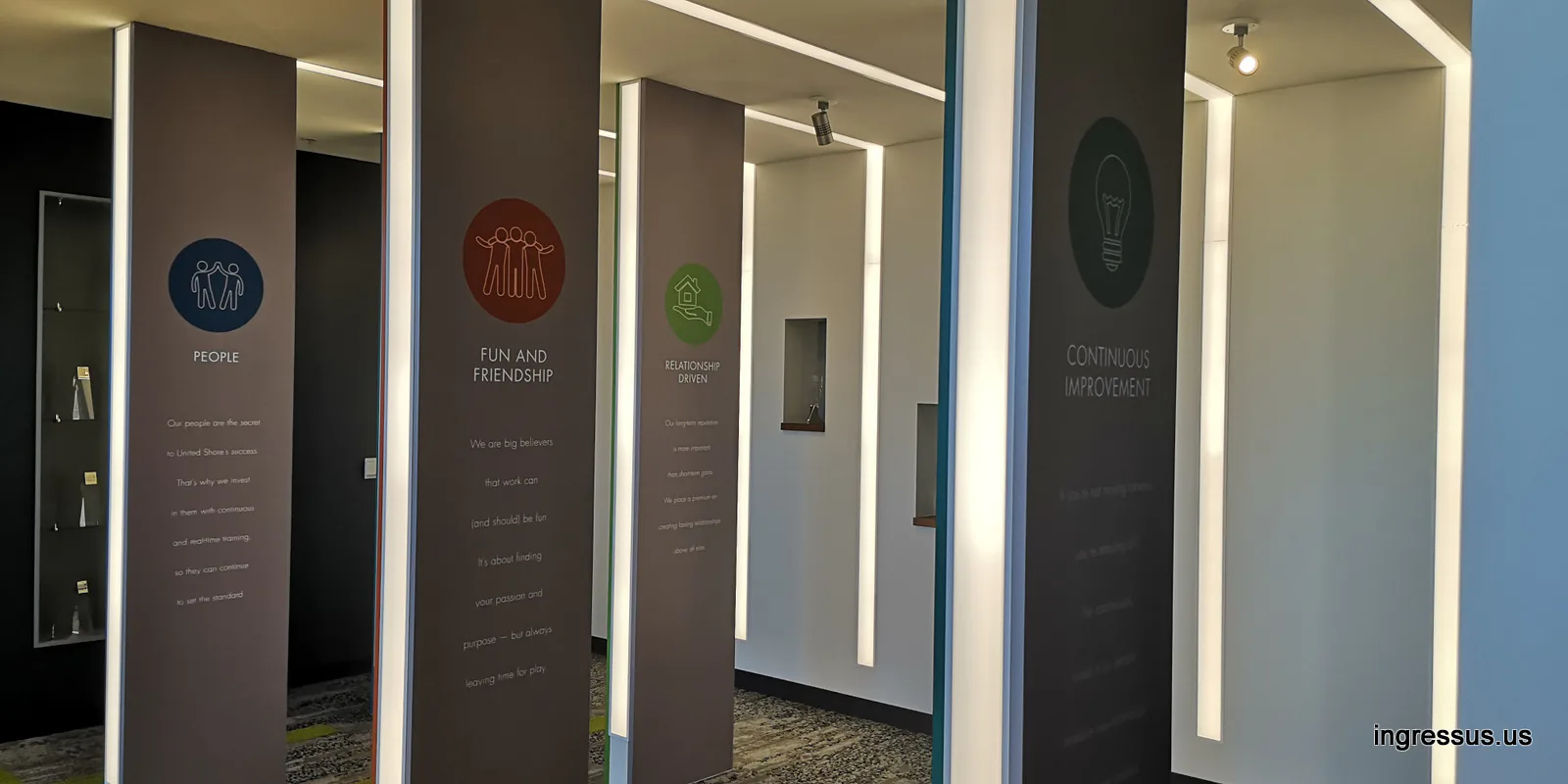 Illuminated panels presenting United Wholesale Mortgage values such as people, fun and friendship and continuous improvement